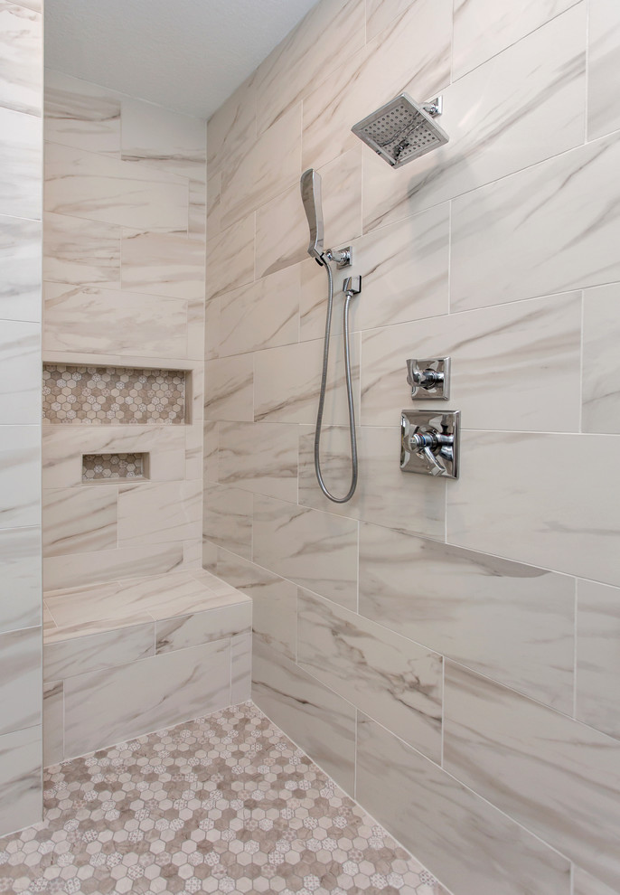 Design ideas for a mid-sized transitional master bathroom in Other with recessed-panel cabinets, white cabinets, a double shower, a two-piece toilet, gray tile, ceramic tile, grey walls, ceramic floors, an undermount sink, engineered quartz benchtops, grey floor and an open shower.