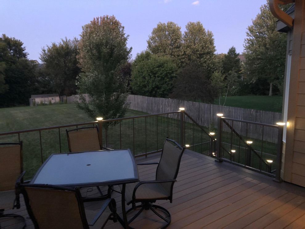 Mid-sized backyard second story cable railing deck photo with no cover