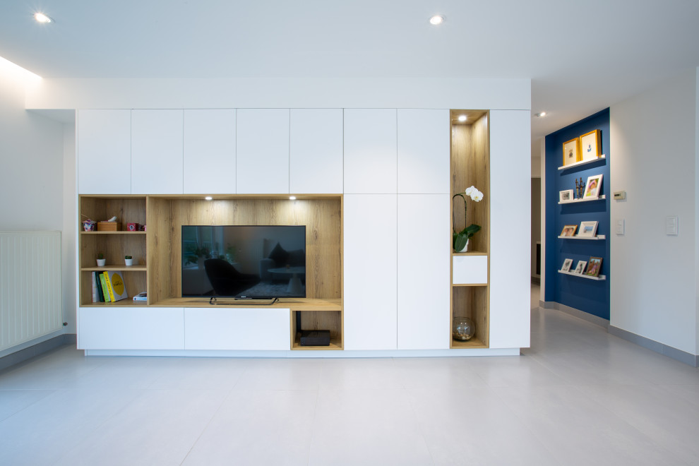 Inspiration for a large contemporary open concept home theatre in Lyon with white walls, ceramic floors and grey floor.