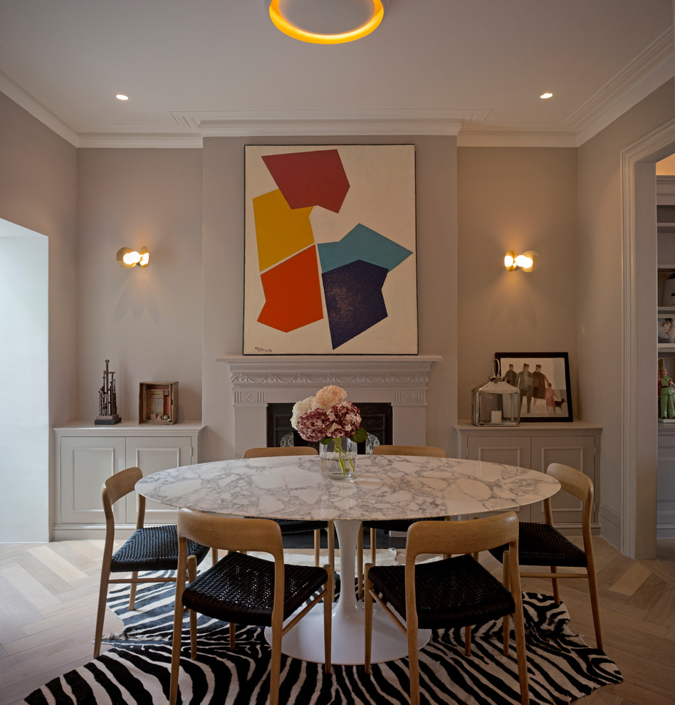 Design ideas for a midcentury dining room in Sussex.