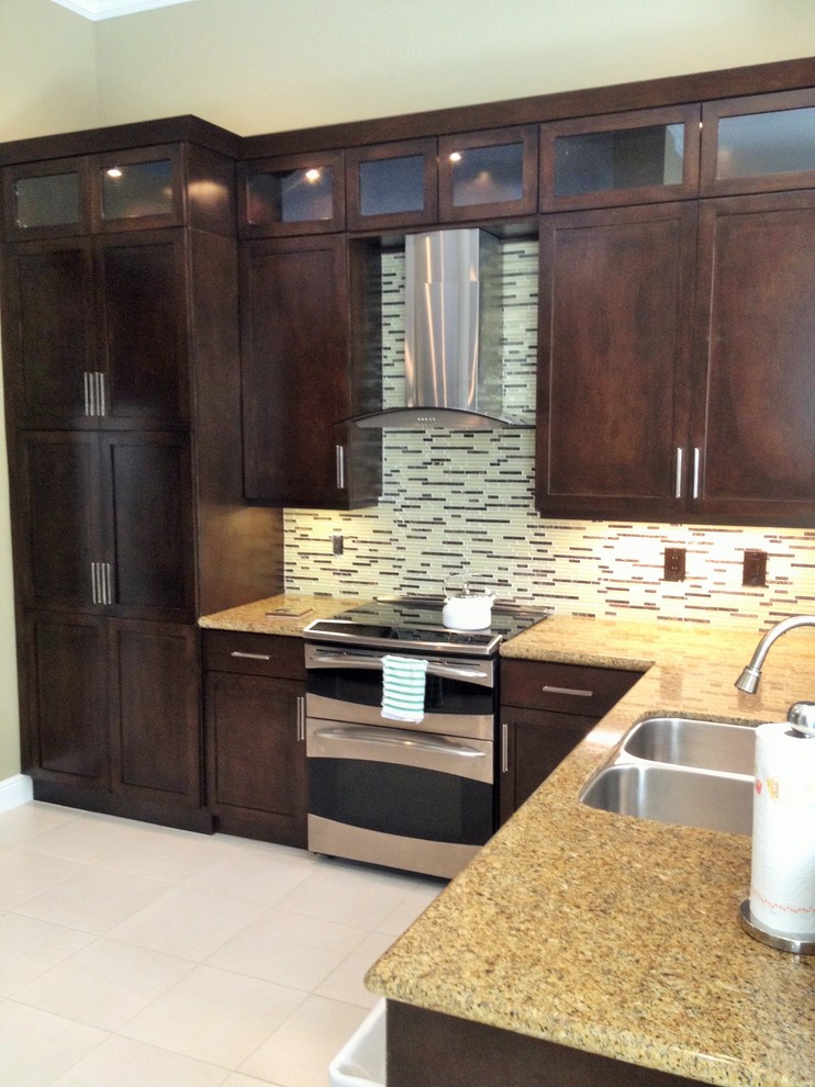 Example of a transitional kitchen design in Miami