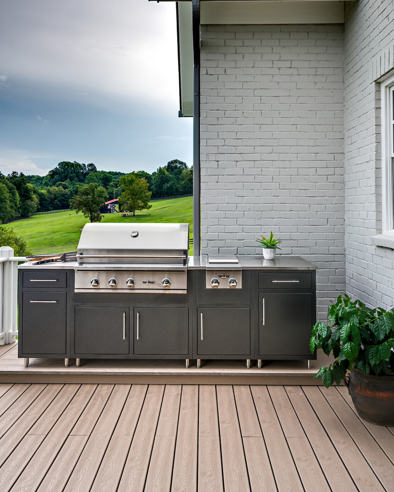 Inspiration for a traditional backyard patio in Nashville with an outdoor kitchen, decking and no cover.