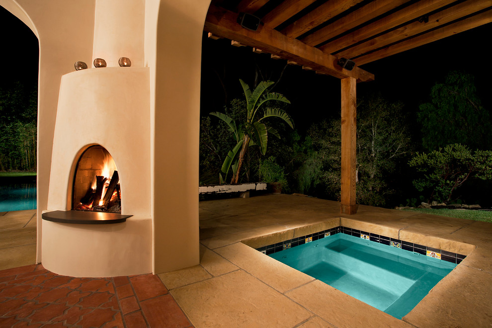 Mediterranean pool in Santa Barbara with a hot tub.