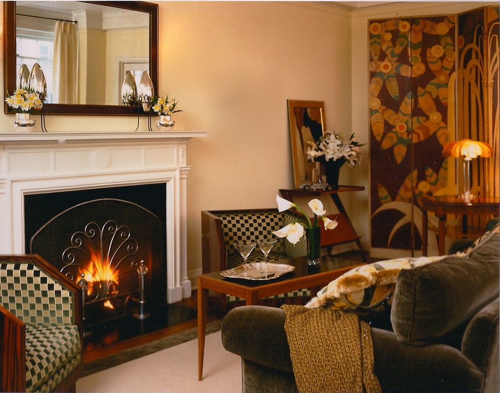 Inspiration for an eclectic living room in New York with beige walls and a standard fireplace.