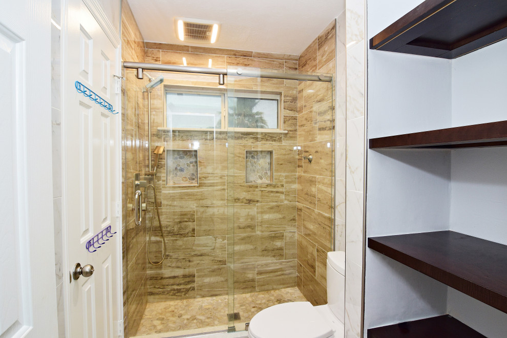 Design ideas for a mid-sized transitional bathroom in Houston.