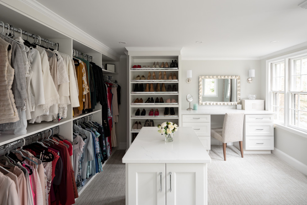Design ideas for an expansive contemporary dressing room in Boston with open cabinets, white cabinets, carpet and white floor.