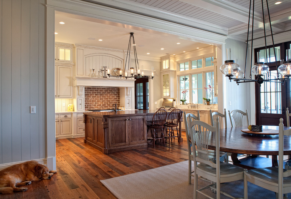 Design ideas for a large traditional u-shaped kitchen in Charleston with an undermount sink, beaded inset cabinets, white cabinets, granite benchtops, stainless steel appliances, medium hardwood floors and with island.