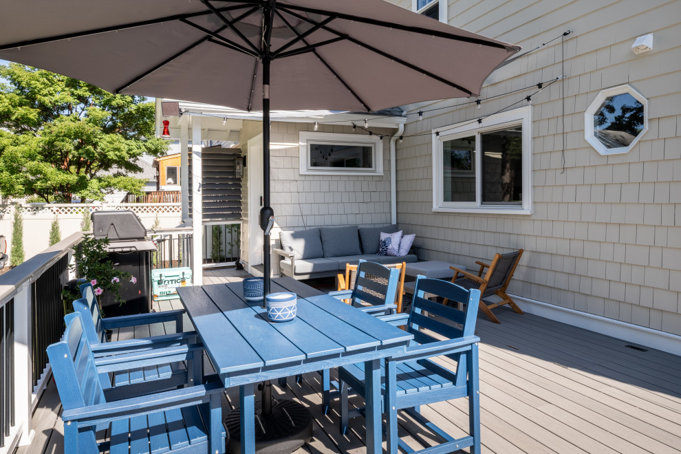Large trendy backyard deck photo in Boston