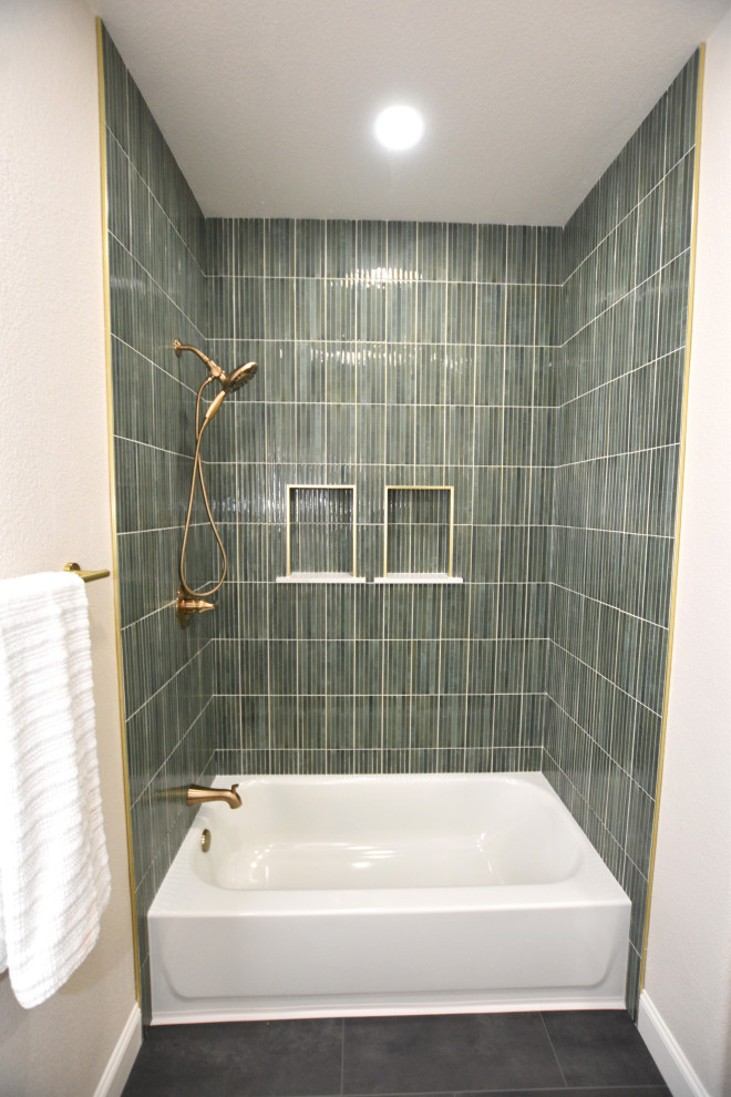 Inspiration for a mid-sized transitional green tile and porcelain tile vinyl floor, gray floor and double-sink alcove bathtub remodel with shaker cabinets, green cabinets, an undermount sink, solid surface countertops, white countertops and a built-in vanity