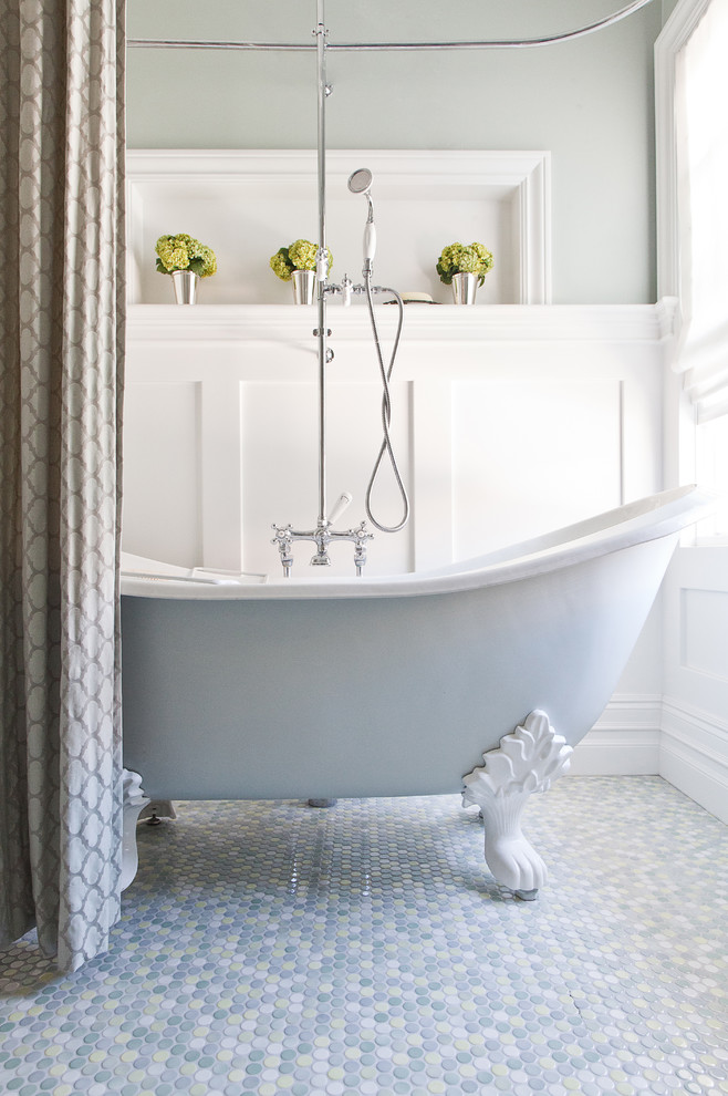 This is an example of a traditional bathroom in San Francisco with a claw-foot tub, mosaic tile and mosaic tile floors.