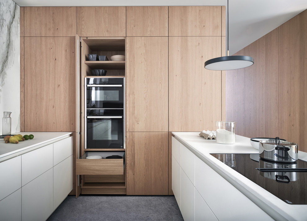 Imagen de cocina comedor moderna grande con armarios con paneles lisos, puertas de armario blancas, encimera de cuarzo compacto y una isla