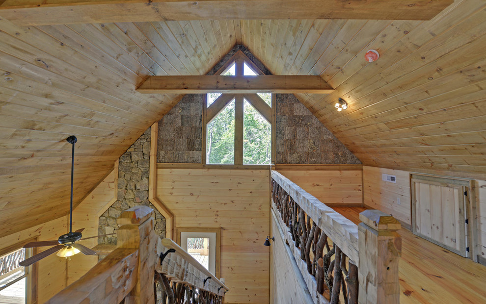 Example of a mountain style home design design in Atlanta