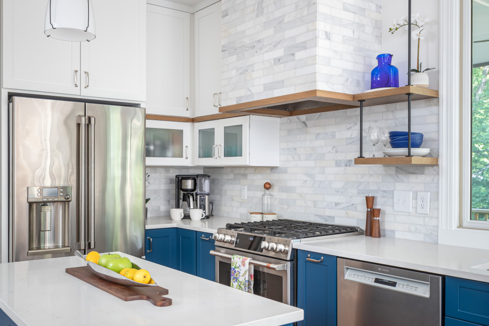 Medium sized traditional l-shaped kitchen/diner in Raleigh with a submerged sink, shaker cabinets, blue cabinets, quartz worktops, white splashback, marble splashback, stainless steel appliances, medium hardwood flooring, an island, brown floors and white worktops.