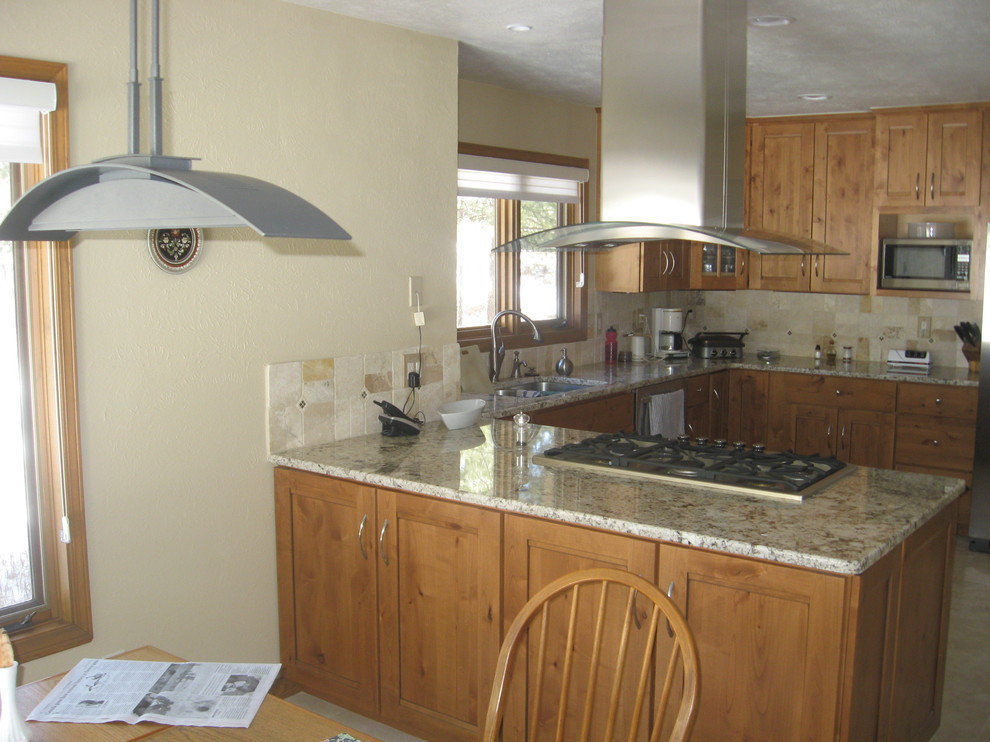 Mid-sized transitional u-shaped kitchen photo in Denver