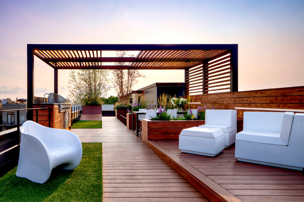 Design ideas for a contemporary rooftop deck in Chicago with a pergola.