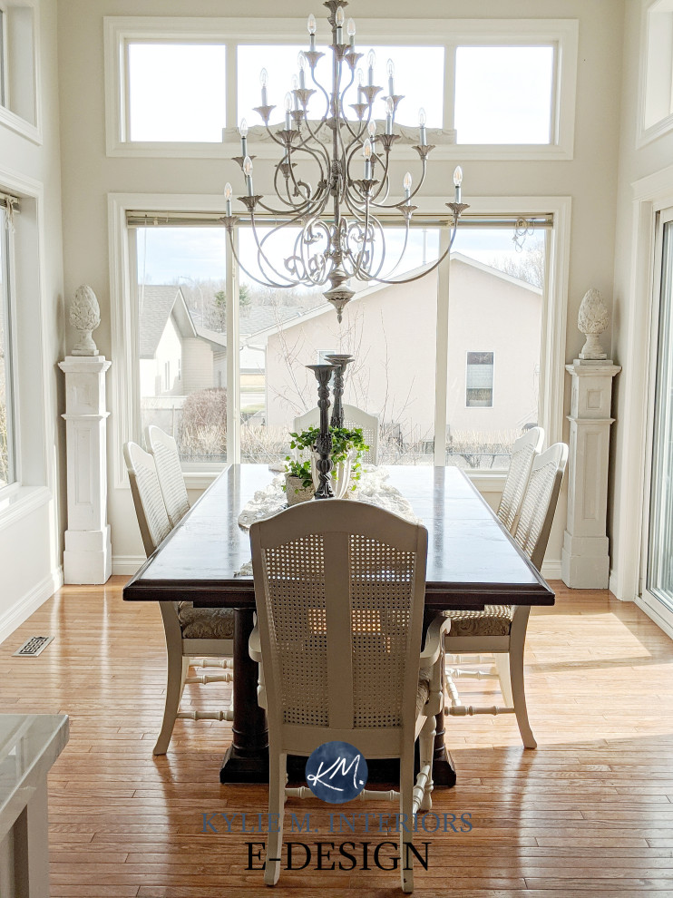 Inspiration for a mid-sized transitional medium tone wood floor breakfast nook remodel with gray walls