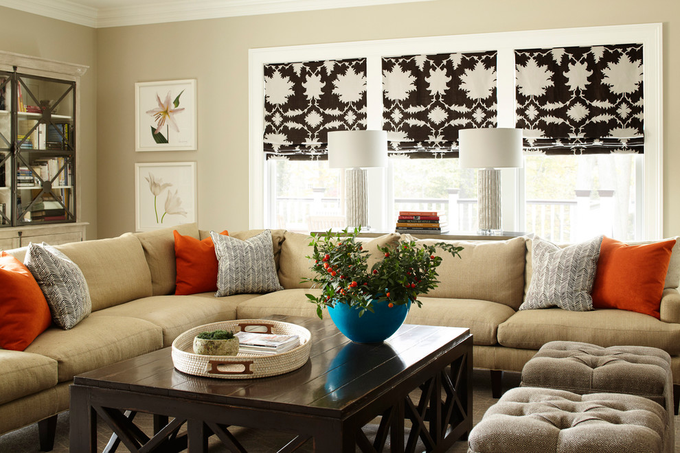 Design ideas for a transitional family room in New York with beige walls.