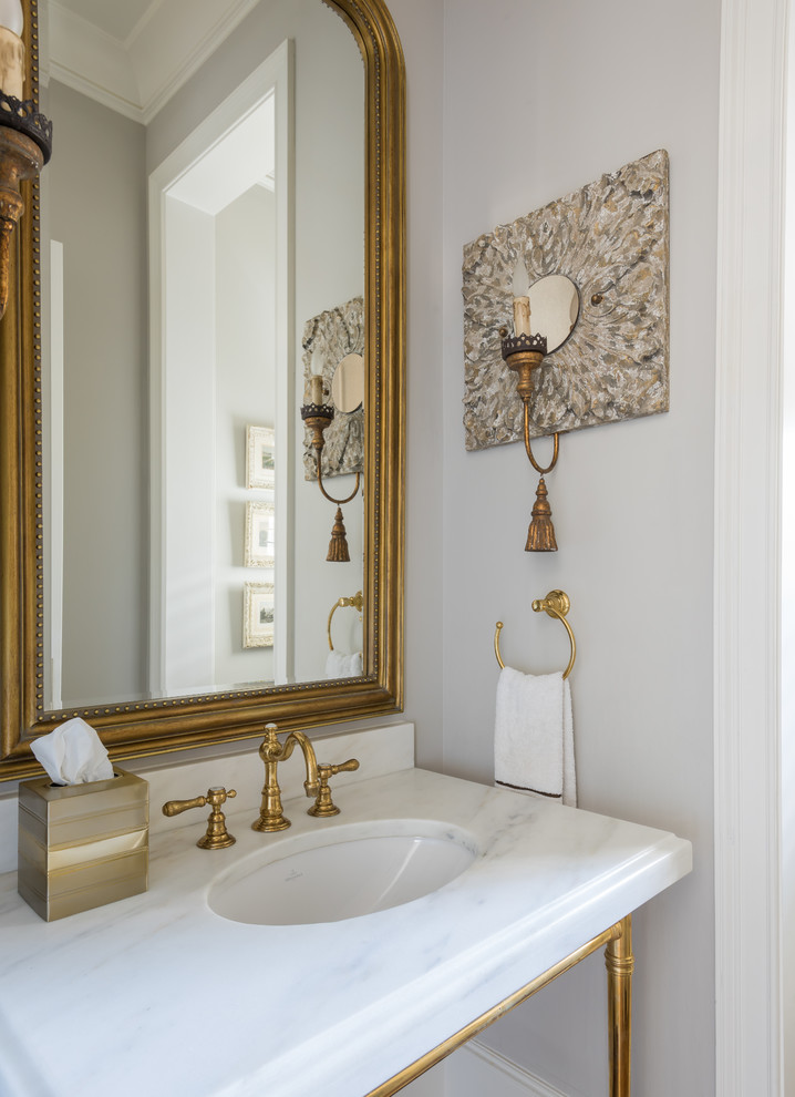 This is an example of a mid-sized traditional 3/4 bathroom in Houston with open cabinets, white cabinets, white tile, white walls, an undermount sink and marble benchtops.