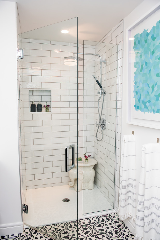 Photo of a mid-sized contemporary master bathroom in Other with flat-panel cabinets, black cabinets, an alcove shower, a one-piece toilet, black and white tile, cement tile, white walls, cement tiles, an undermount sink and quartzite benchtops.