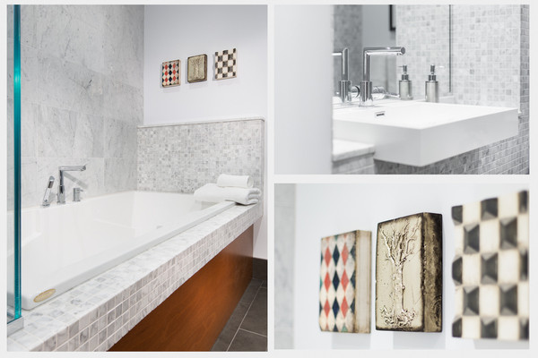 Design ideas for a large contemporary master bathroom in Montreal with grey cabinets, engineered quartz benchtops, a claw-foot tub, an alcove shower, a one-piece toilet, gray tile, mosaic tile, grey walls and ceramic floors.