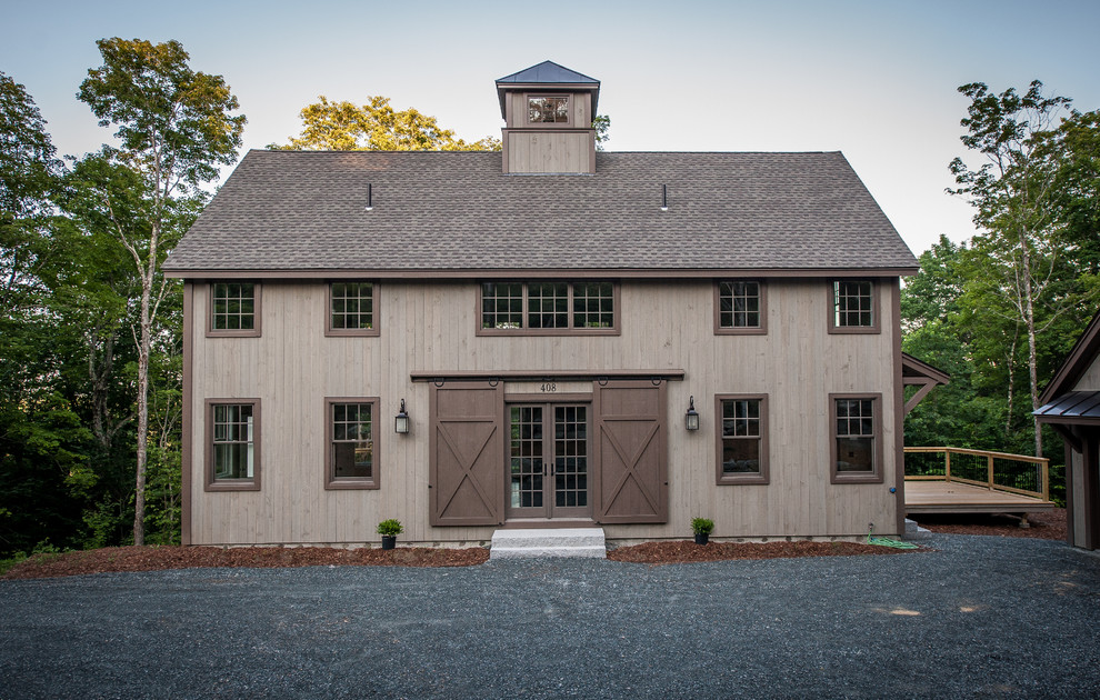 Mid-sized cottage brown two-story wood gable roof photo in Boston