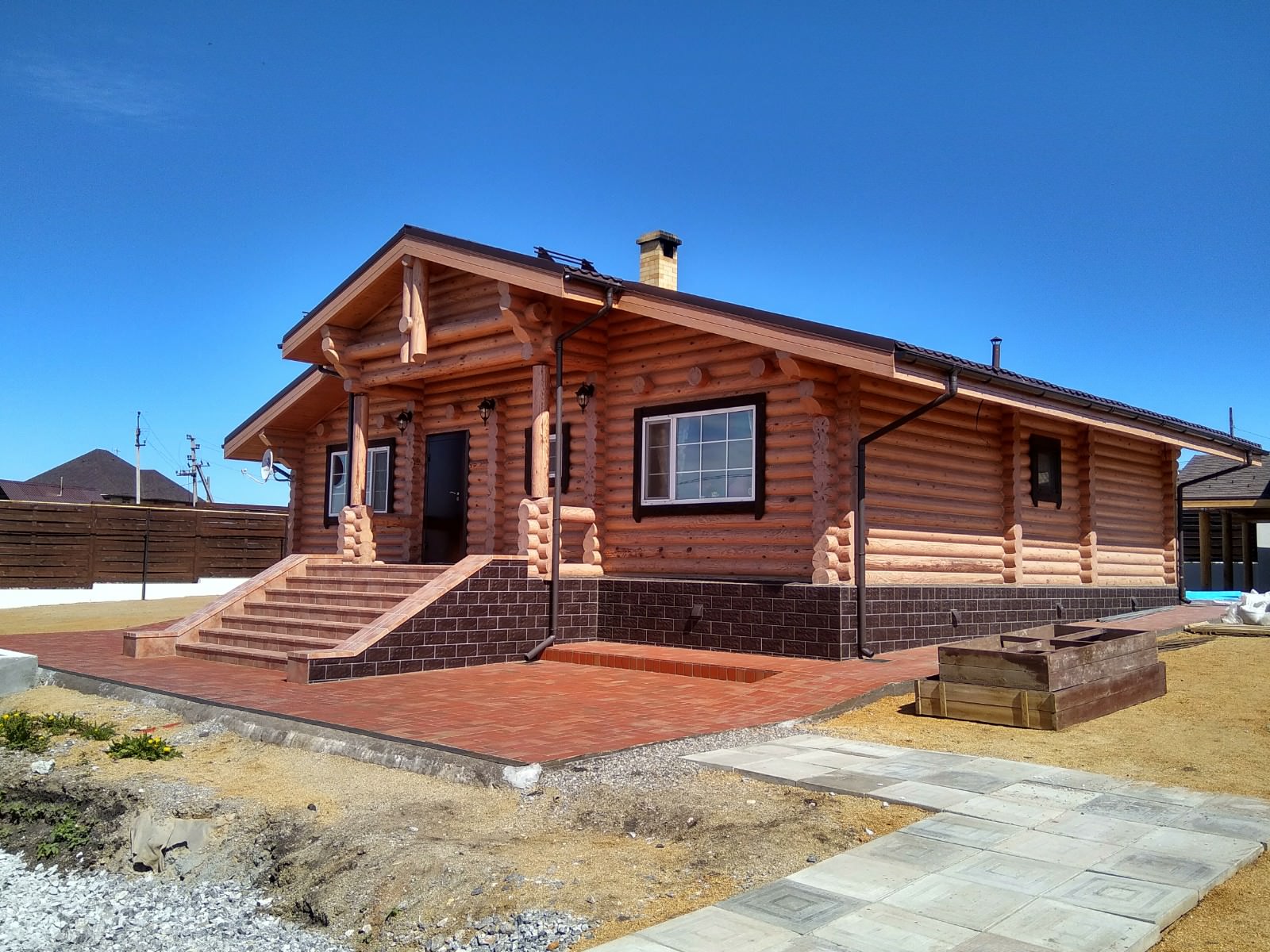 плитка stroeher на фасаде деревянного дома