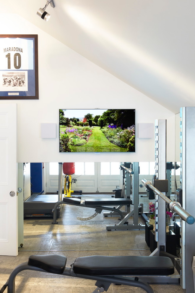 Inspiration for a small contemporary multipurpose gym in London with white walls, limestone floors and grey floor.