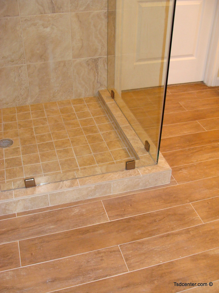 Example of a transitional multicolored tile and porcelain tile porcelain tile home design design with an undermount sink and white cabinets