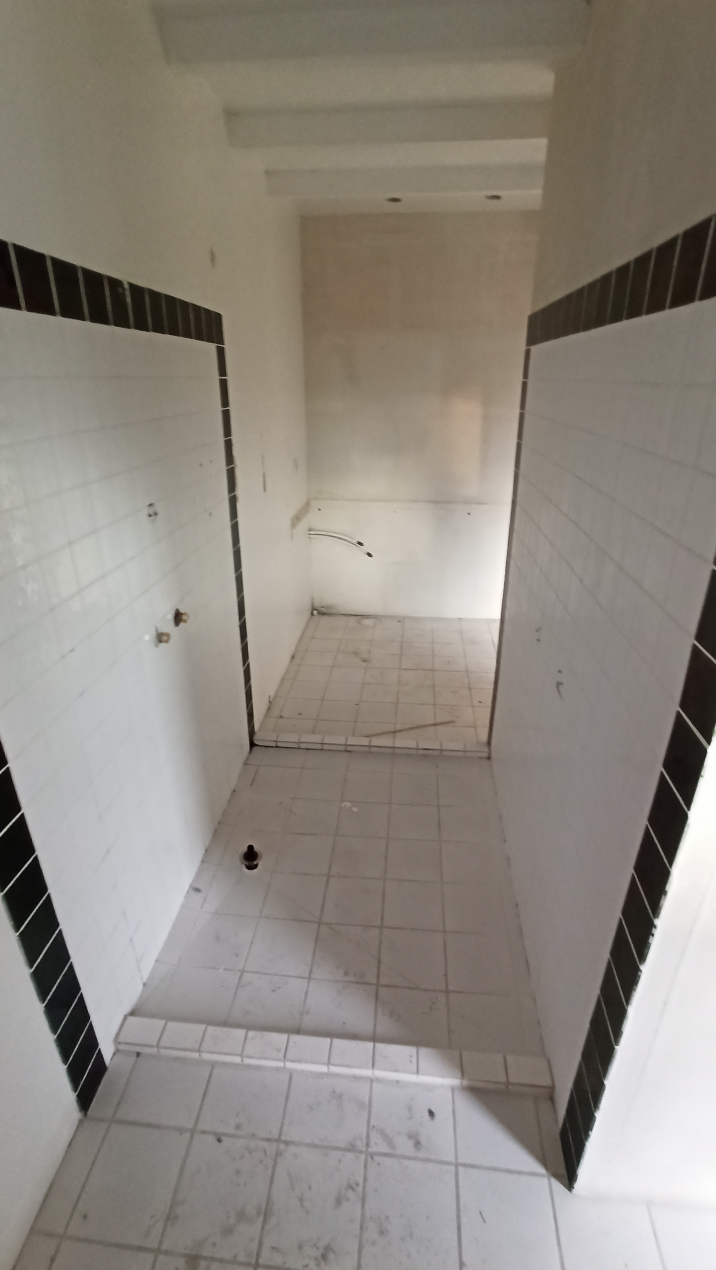 Transformation d'une chambre parentale en pièce de vie/cuisine