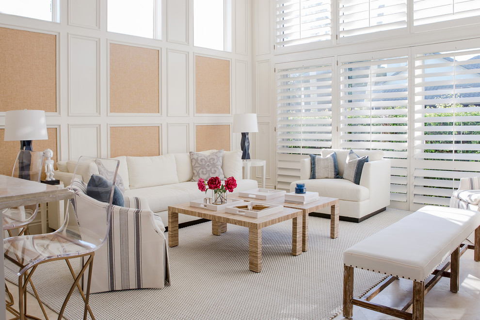 Transitional carpeted and beige floor living room photo in Miami with white walls
