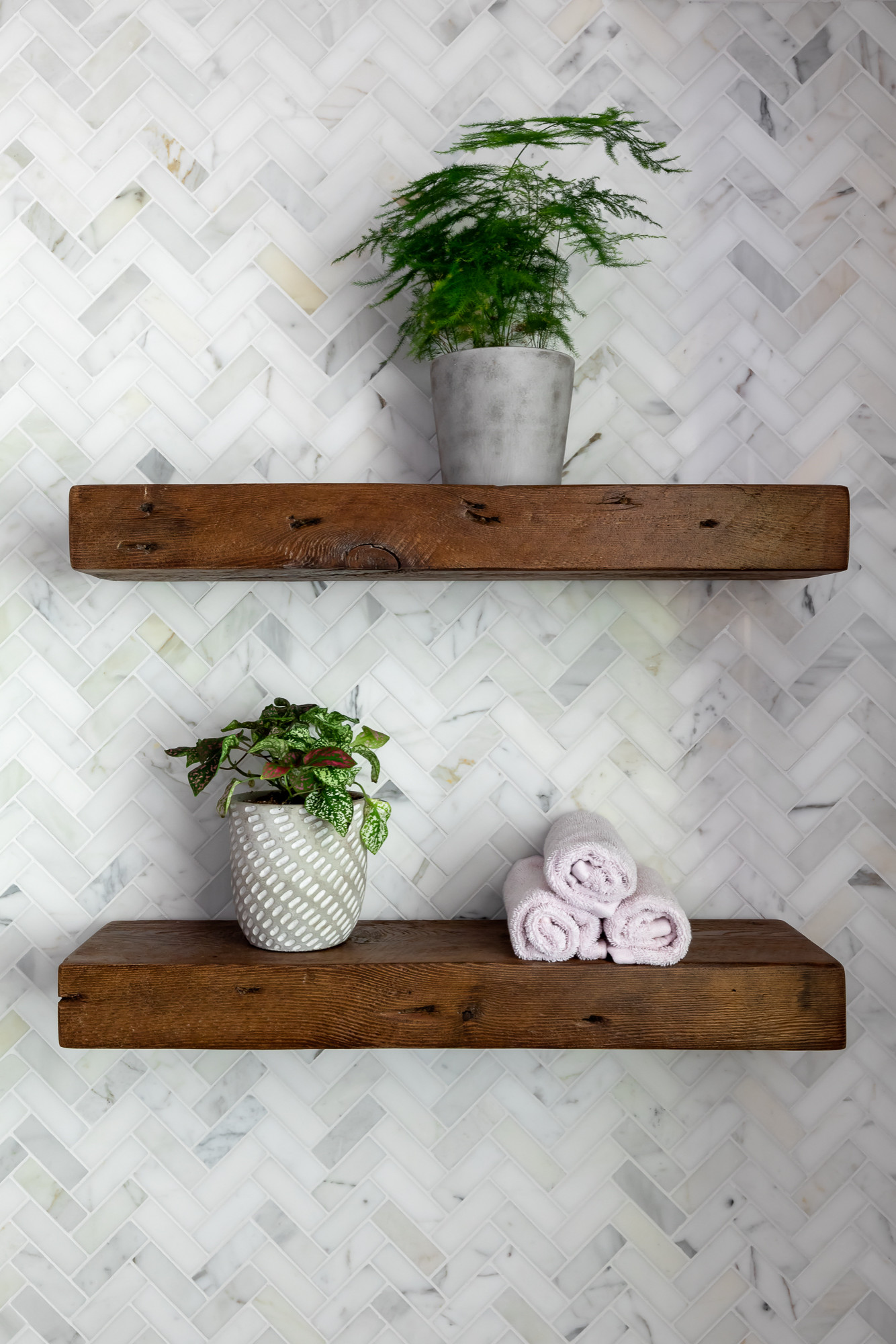 Ensuite Backsplash Detail Marbled Mosaic in a Chevron Pattern