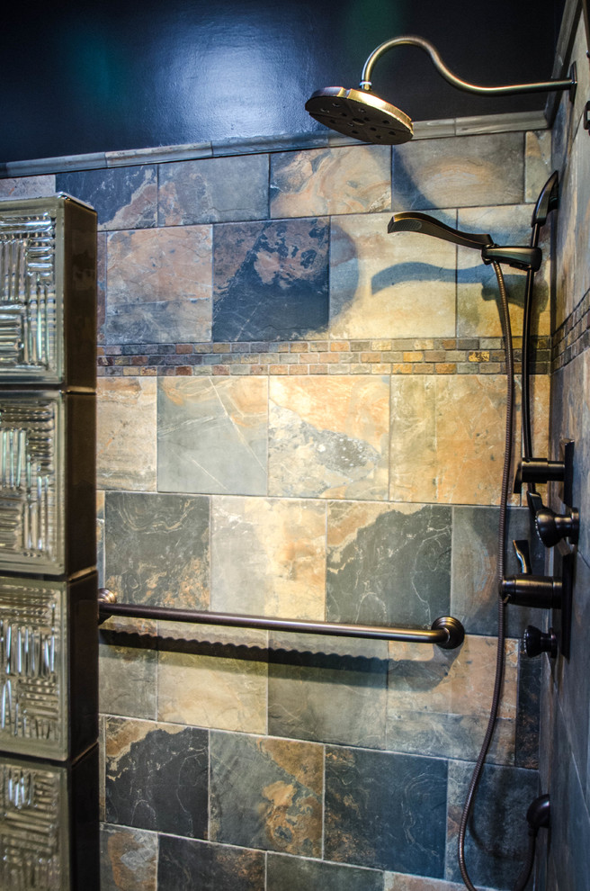 Example of a mid-sized mountain style multicolored tile and slate tile slate floor and multicolored floor walk-in shower design with black walls
