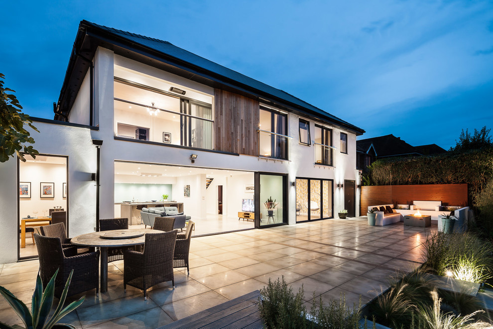 This is an example of a contemporary deck in Surrey.