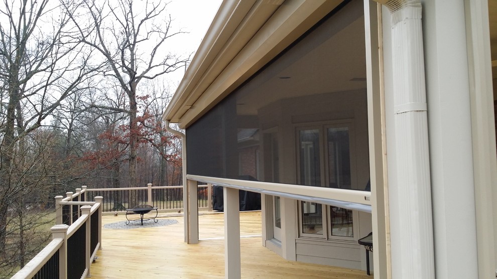 Photo of a large arts and crafts backyard screened-in verandah in Louisville with a roof extension and decking.