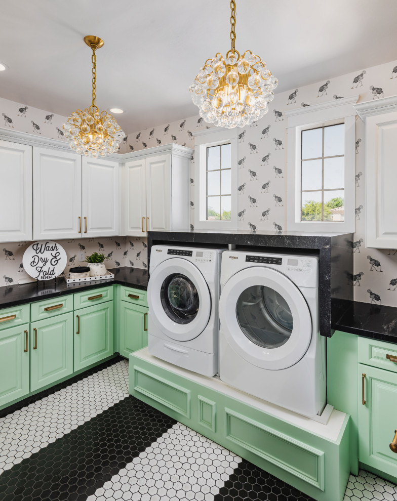 Inspiration for a large classic u-shaped separated utility room in Phoenix with recessed-panel cabinets, green cabinets, composite countertops, multi-coloured walls, porcelain flooring, a side by side washer and dryer, black worktops and wallpapered walls.