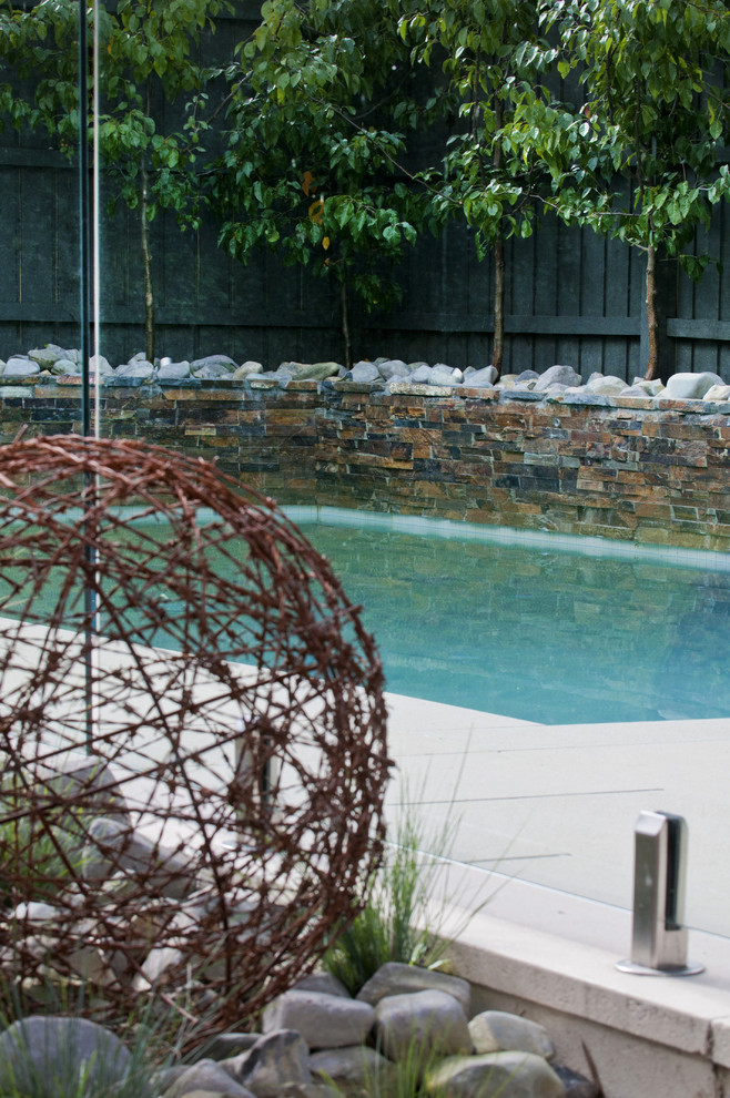 Inspiration for a traditional pool in Melbourne.