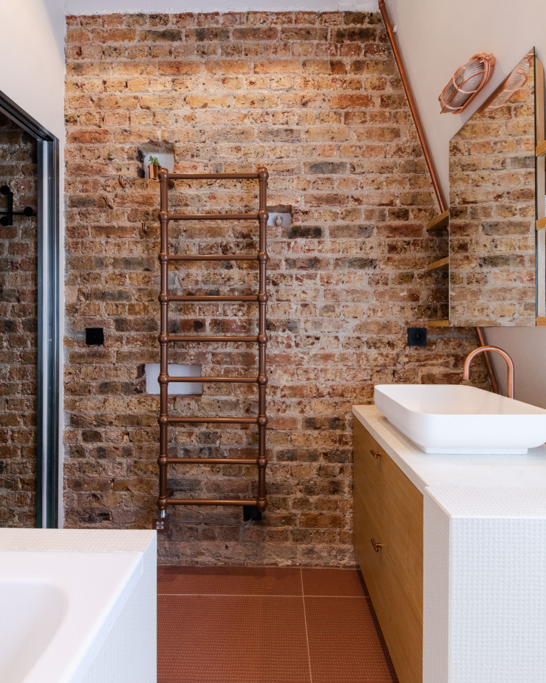 Contemporary bathroom in Paris with light wood cabinets, an undermount tub, an open shower, white tile, ceramic tile, white walls, ceramic floors, tile benchtops, red floor, white benchtops, a single vanity, a floating vanity and brick walls.