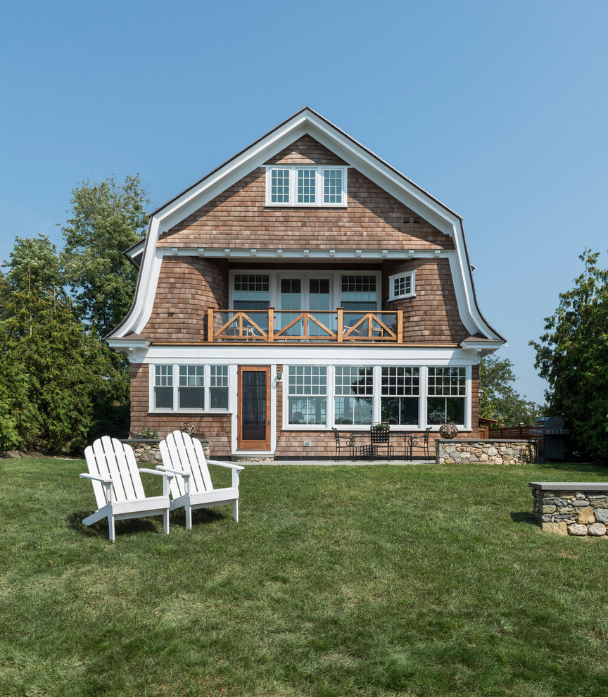 Design ideas for a traditional brown exterior in Providence with wood siding and a gambrel roof.