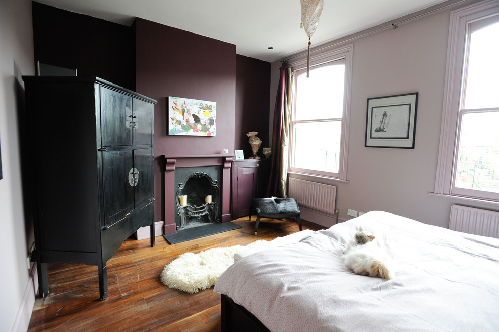 This is an example of an eclectic bedroom in London.