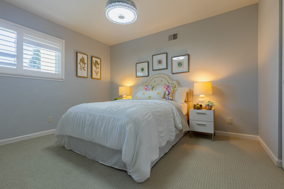 Photo of a medium sized contemporary kids' bedroom in San Diego with grey walls, carpet and white floors.