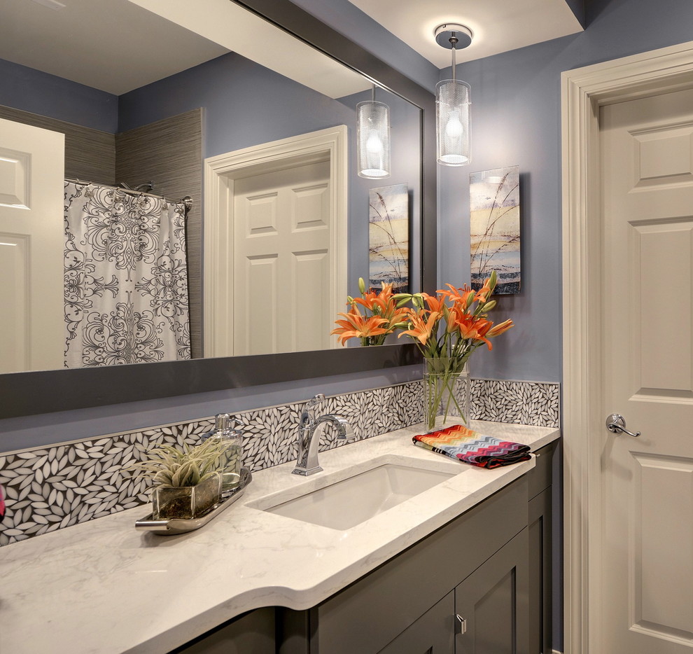 Traditional bathroom in Minneapolis with an undermount sink and grey cabinets.