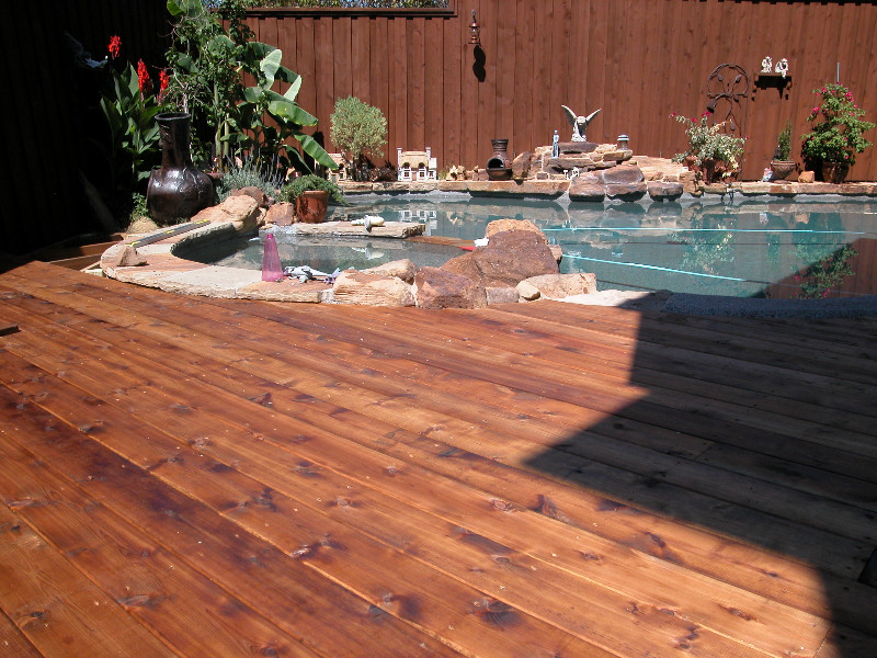 Inspiration for a large transitional backyard deck remodel in Dallas with no cover