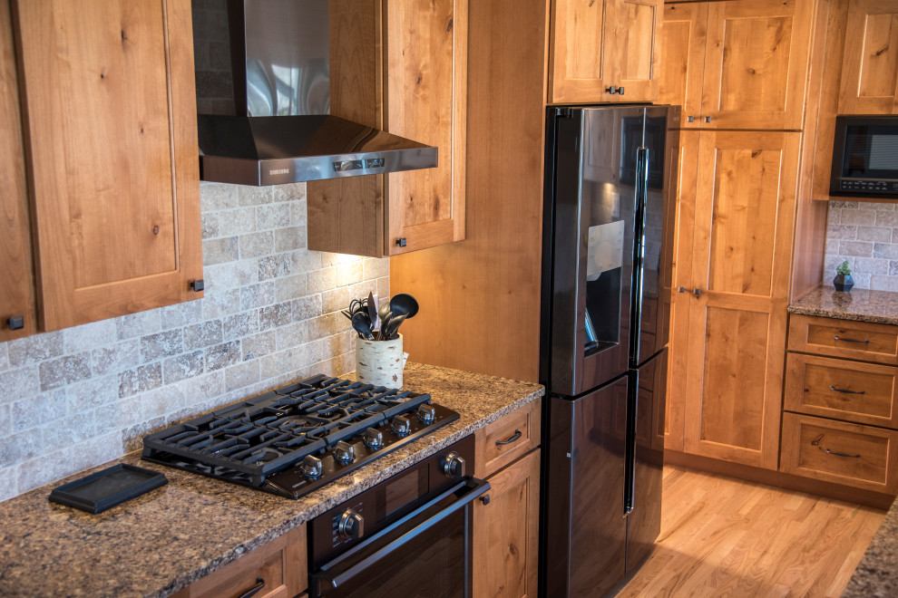 Example of a mountain style kitchen design in Denver