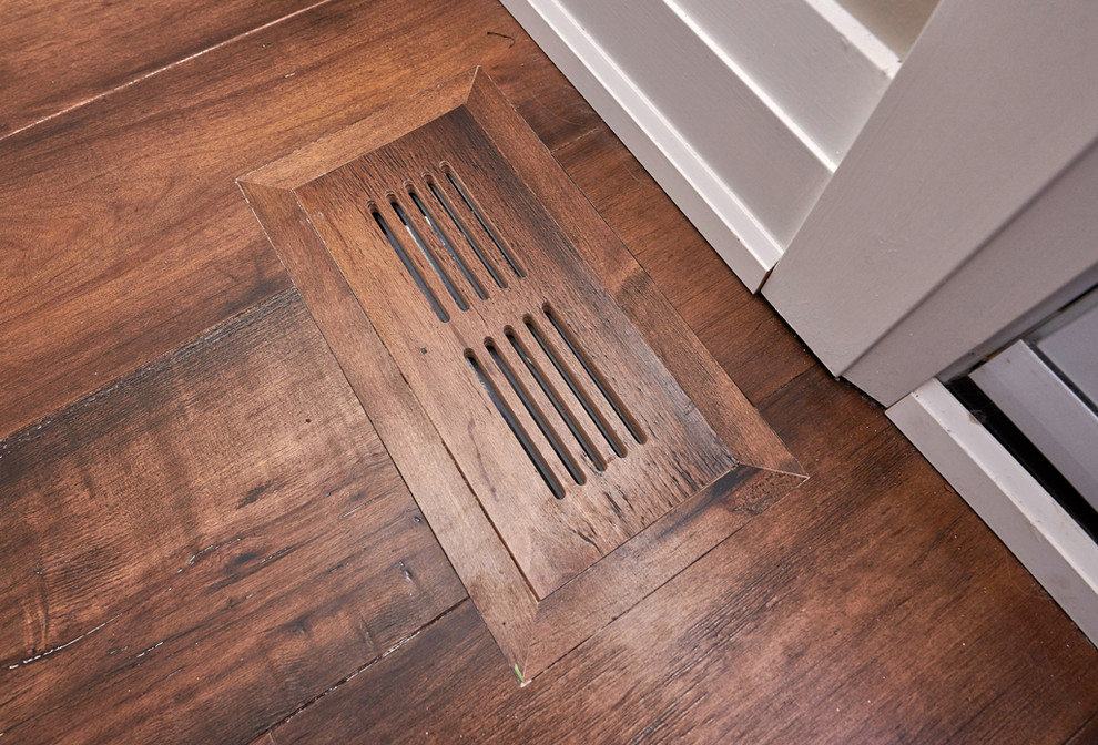 Inspiration for a large transitional galley dark wood floor and brown floor eat-in kitchen remodel with an undermount sink, shaker cabinets, white cabinets, quartz countertops, multicolored backsplash, mosaic tile backsplash, stainless steel appliances, an island and multicolored countertops