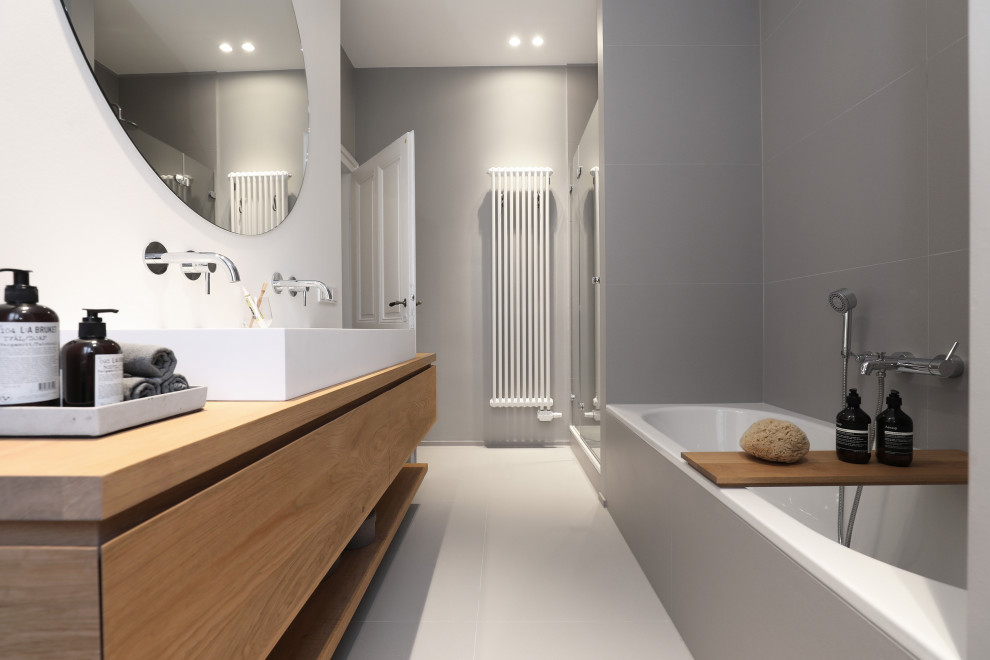 Design ideas for a large traditional bathroom in Frankfurt with white walls, light hardwood flooring and wooden worktops.