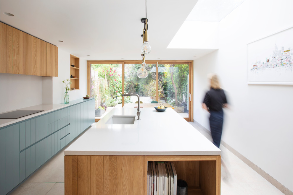 Photo of a mid-sized contemporary kitchen in London.