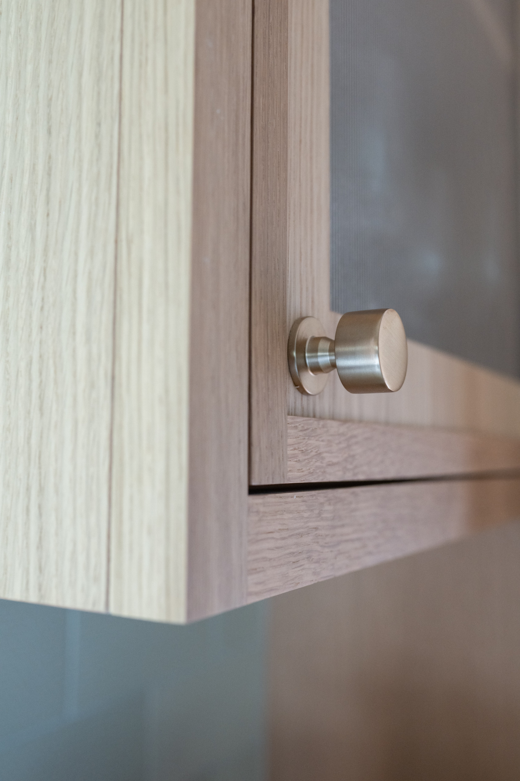 Warm Modern Kitchen Renovation with Natural Oak & Green Accents