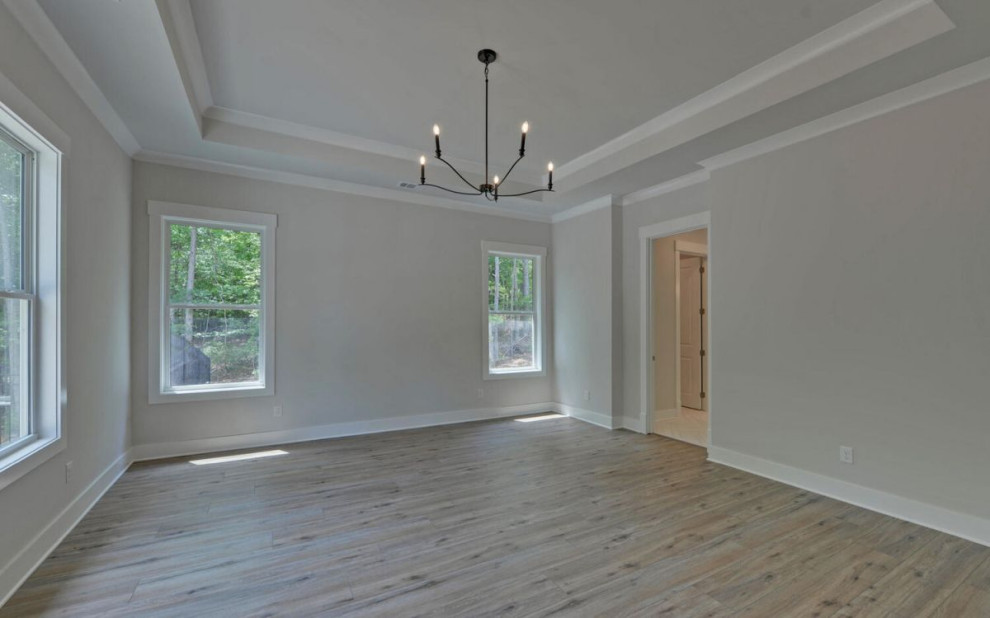 Example of a transitional home design design in Atlanta