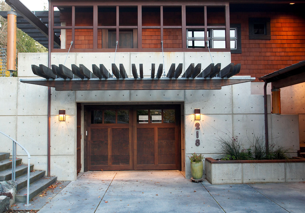 Inspiration for a large contemporary attached one-car garage in Seattle.