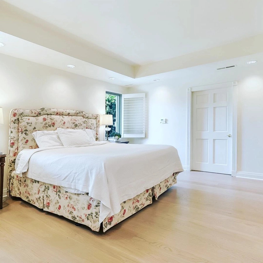 Inspiration for a traditional bedroom in New Orleans with medium hardwood floors.